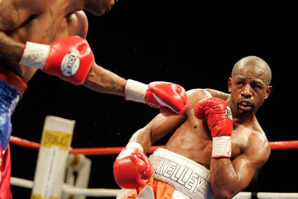 Kevin Kelley, right, ducks a punch by Jaime Palma during their lightweight boxing match at the Las Vegas Hilton Tuesday, July 8, 2008.  