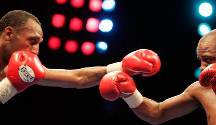 Kevin Kelley, right, and Jaime Palma fight during a lightweight boxing match at the Las Vegas Hilton. 