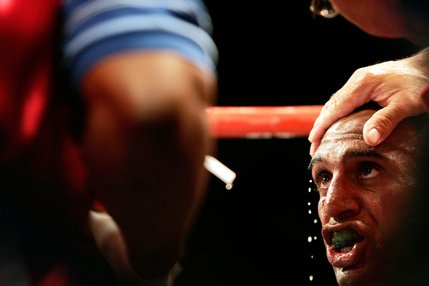 Jaime Palma takes a break between rounds during his lightweight boxing match against Kevin Kelley at the Las Vegas Hilton.