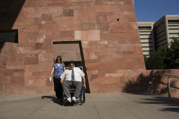 Kathy, left, and Tom Urbanski arrive at the Regional Justice ...