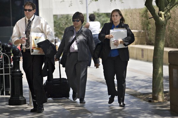 Las Vegas Metropolitan Police detective, Kirk Jordan, left, chief deputy ...