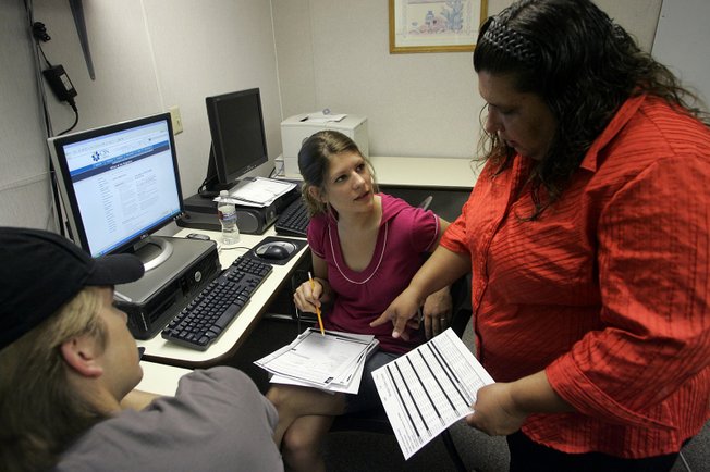 CSN student Brittany Hentzell, 20, seated, talks with site coordinator April Krell at the Moapa Valley center. Hentzell plans to finish an associate degree this fall. She said she might not have started college had CSN not had its campus in Logandale. 