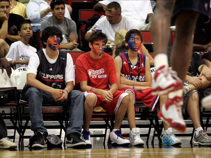 Clippers fans, from left, Shayan Boloor, Logan Schwartz and Josh Rudin watch as Los Angeles takes on the Charlotte Bobcats during the NBA Summer League on Saturday, July 12, at COX Pavilion.