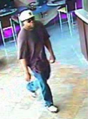Police released this surveillance video image of a bank robbery suspect.