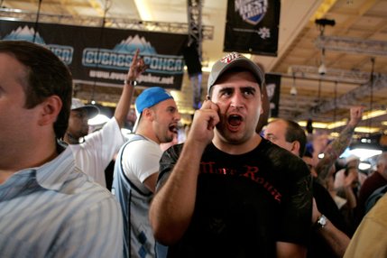Robert Mizrachi of Hollywood, Fla. excitedly tells a friend on the phone that his friend David 