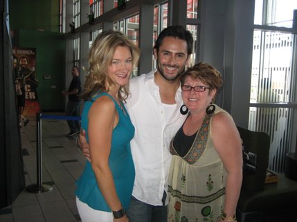 Carol Linnea Johnson, Victor Wallace, Robin Baxter pose for a photo. 