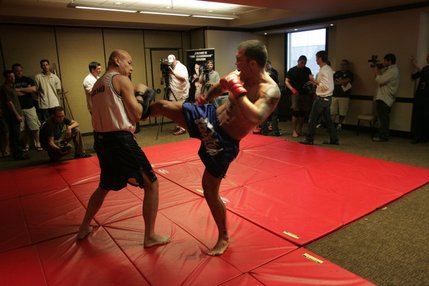 James Irvin works out with a partner during a media session Thursday, July 17. 
