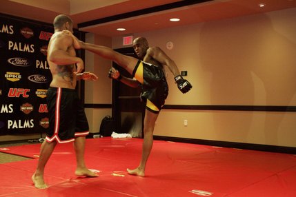 Anderson Silva kicks sparring partner Rafael Custodio during a media workout on Thursday, July 17. 