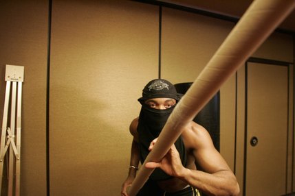 Anderson Silva clowns around, pretending to be a ninja after a media workout Thursday, July 17. 