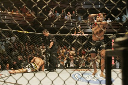 Anderson Silva celebrates his first round TKO of James Irvin during their UFC bout at the Palms.