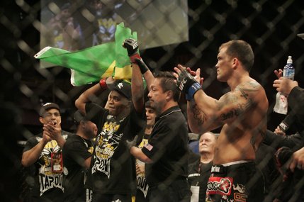 Anderson Silva celebrates his first round TKO of James Irvin, right, after their UFC bout at the Palms.
