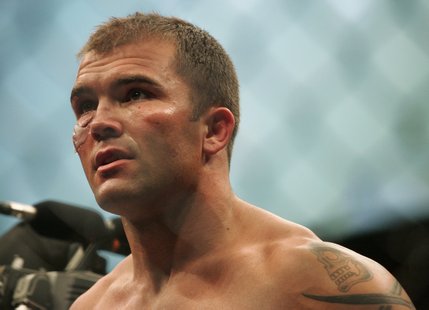 A battered James Irvin leaves the octagon after his UFC bout against Anderson Silva at the Palms.