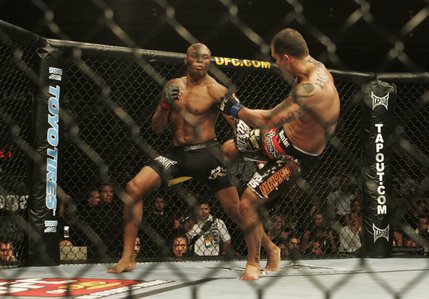 Anderson Silva takes down James Irvin in the first round of their UFC bout at the Palms on Saturday. Moments later, Silva finished off Irvin for a TKO at 1:01. 