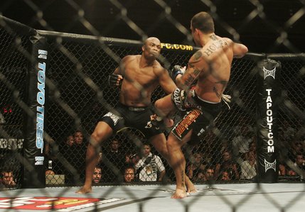 Anderson Silva takes down James Irvin in the first round of their UFC bout at the Palms on Saturday.