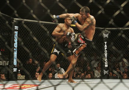 Anderson Silva takes down James Irvin in the first round of their UFC bout at the Palms on Saturday. Moments later, Silva finished off Irvin for a TKO at 1:01. 