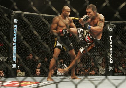Anderson Silva takes down James Irvin in the first round of their UFC bout at the Palms.