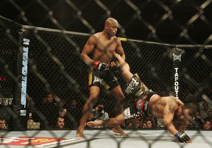 Anderson Silva takes down James Irvin in the first round of their UFC bout at the Palms on Saturday.