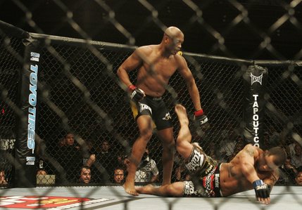 Anderson Silva takes down James Irvin in the first round of their UFC bout at the Palms on Saturday.