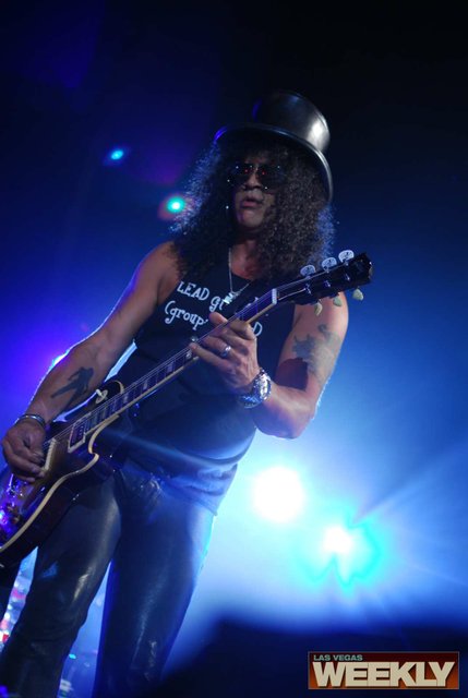 Slash performs at his 43rd birthday celebration Wednesday at Bare Pool.