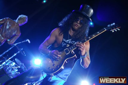 Slash performs at his 43rd birthday celebration Wednesday at Bare Pool.