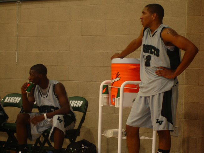 Elijah Johnson, left, and Anthony Marshall watch from the bench in the closing moments of the Las Vegas Prospects' 85-67 loss to the Compton Magic Wednesday evening at Rancho High School in pool play of the adidas Super 64. Johnson, a senior-to-be at Cheyenne, and Marshall, who will be a senior at Mojave this fall, joined forces for the first time since seventh grade this week, and have discussed the possibility of playing together at the next level. The two are both ranked by Rivals.com as top-70 recruits in the class of 2009.