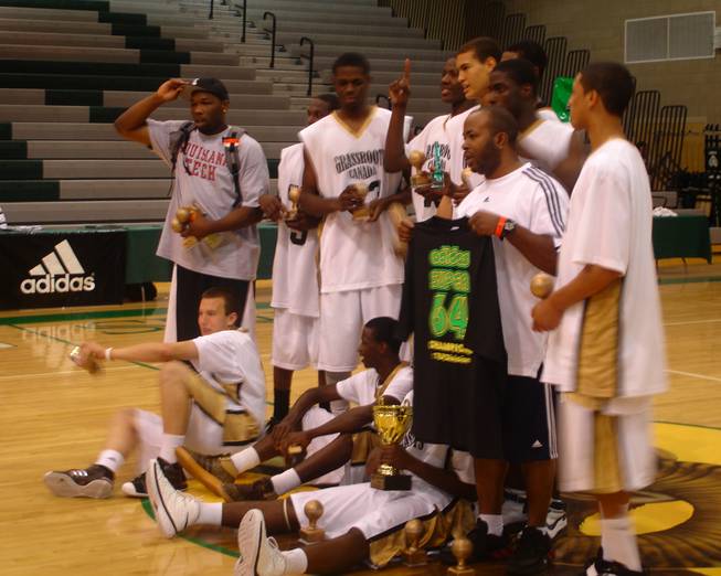 The Grassroots Canada Elite squad poses for photos following an 88-79 double-overtime win over the Compton Magic, clinching the title at the 2008 adidas Super 64 Saturday night at Rancho High.