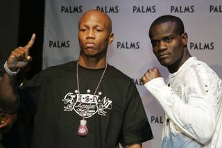Zab Judah and Josh Clottey pose during a news conference at the Palms Thursday, July 31, 2008. The boxers will fight for the vacant IBF welterweight title at the Palms on Saturday.