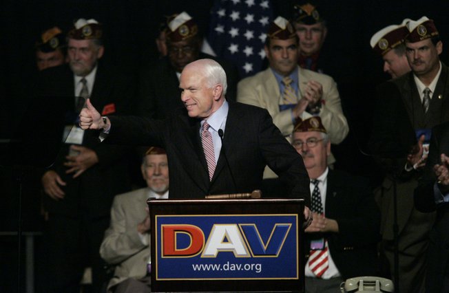 John McCain warms up the crowd of disabled veterans Saturday, Aug. 9, 2008, at Bally's. The veterans also heard from Sen. Barack Obama, by videotape.