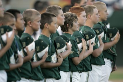 The Paseo Verde All-Stars stand for the national anthem before playing the team from Waipio, Hawaii in the western regional championship game of the Little League World Series Sunday.