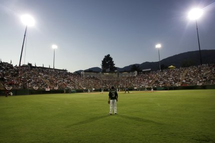 Paseo Verde All-Stars' Stevie Farmer controls center field during their game against Waipio, Hawaii, in the western regional championship game of the Little League World Series Sunday.