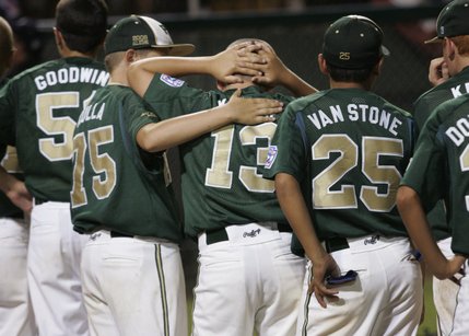 Paseo Verde All-Stars' Joey Kulla comforts Jesse Keiser after their 4-3 loss to Waipio, Hawaii, in the western regional championship game of the Little League World Series Sunday.