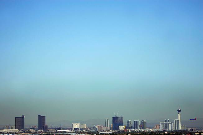 When we left Las Vegas on Tuesday, I couldn't help but notice the thick layer of haze/smog/dust that hung above the valley in a menacing way. We're headed to Phoenix. My thought is, I wonder if they have the same problem? Another city with big growth and big traffic. <em> - Leila Navidi</em>. 