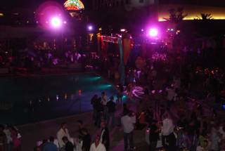 The crowd takes in the scene at the annual Midsummer Night's Dream party at the Palms.