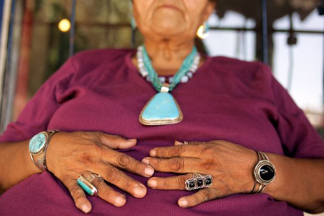 Of all the people selling handmade jewelry and crafts in old town Albuquerque, Juanita Peters was one of the only ones wearing a lot of jewelry. She sports a few pieces made by her sister's husband, and one made by the artist in the space next to her. "I've been making jewelry since I was 9 years old," said Peters, of Santo Domingo Pueblo. She's been selling jewelry at the Historic Old Town Portal for about seven years. The Portal is run by the city of Albuquerque, and there are 15 spaces for vendors. With about 50 permit holders there is a weekly lottery for spaces. - Leila Navidi