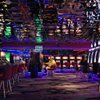 Sherry Cohen, center, plays slots Thursday with her husband, Glenn, at the Rainbow Club & Casino in downtown Henderson. Larger properties' pain has been this small casino's gain. 