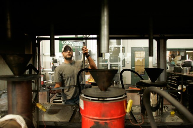 Adam Hutchinson, a Colorado State University mechanical engineering student, works in the Engine and Energy Conversion Lab in Fort Collins, Colo. The lab is developing cleaner burning stoves for use in developing nations, where indoor air pollution is a major killer.