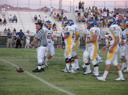 The referee halts play in the first quarter and the Barons prepare to line up -- again.