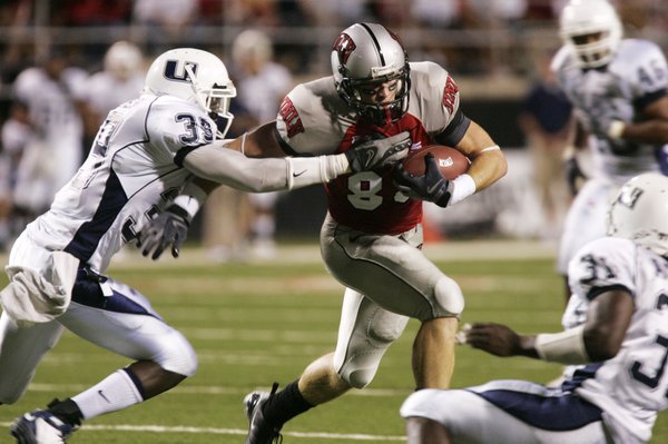 Utah State safety Caleb Taylor tries to stop UNLV wide ...