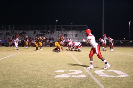 Players get into position Friday during Valley's matchup on Del Sol's home turf.