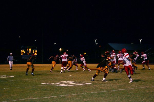 Players spring into action as the ball comes into play ...