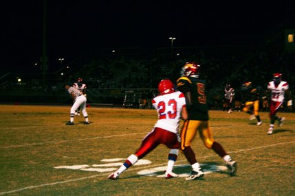 Valley wide receiver Mitchell Deas tries to get past Del Sol defensive back Dean Wallace during Friday night's matchup at Del Sol. 