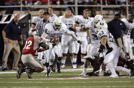 UNLV's Channing Trotter, left,  catches an onside kick by Utah State at Sam Boyd Stadium.
