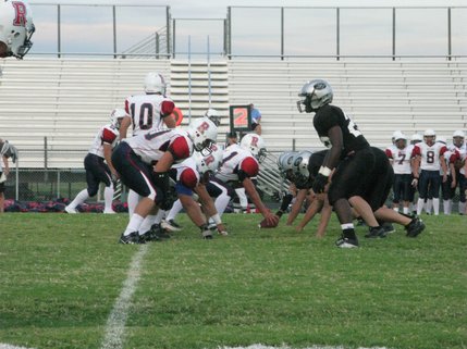 The Palo Verde defense lines up against Reno High School during Reno's first possession of the game. The Panthers' defense kept Reno from scoring a single point.