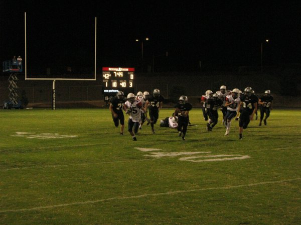 Reno wide Receiver Austin Woods makes a catch and charges ...