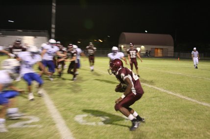 James Poole receives a pass during the fourth quarter of the game.