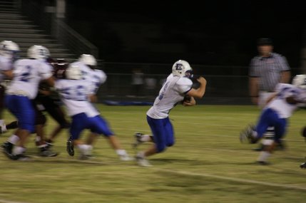 Taron Jones carries the ball during the game against Dixie.