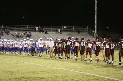 Cimarron-Memorial players congratulate the visiting Dixie team after Friday's game.