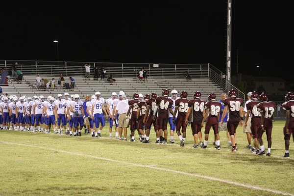 Cimarron-Memorial players congratulate the visiting Dixie team after Friday's game.