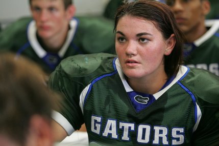 Green Valley's defensive back Jamie Briske listens to head coach Matt Gerber before the season opener against Bonanza on Friday.