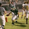 Green Valley's No. 21 Skyler Holloway gets up after scoring against a touchdown during a home game against Basic High Friday.